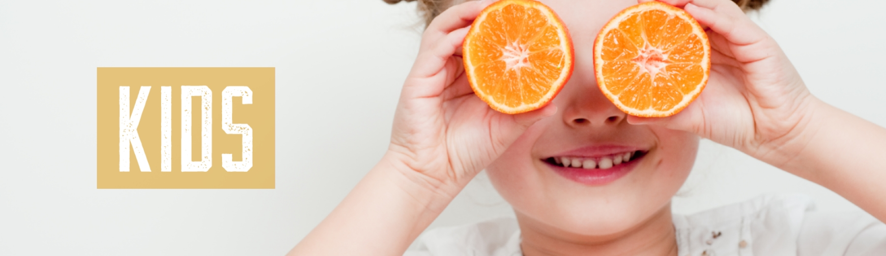 kid with oranges for eyes header 