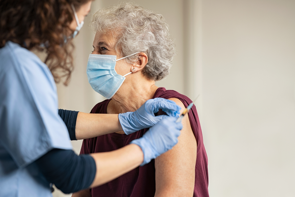 woman getting a vaccination